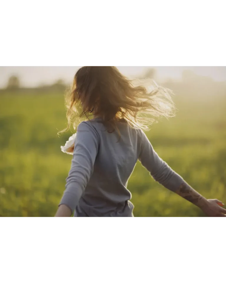 Beverley Carouzzo lady running in field